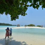 A girl enjoying Virgin beach at Pari island
