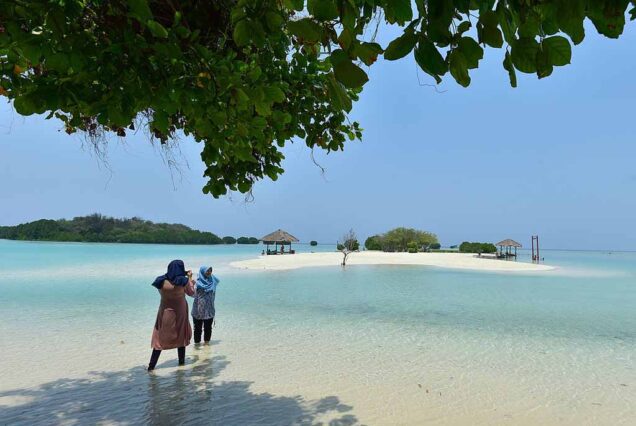 A girl enjoying Virgin beach at Pari island