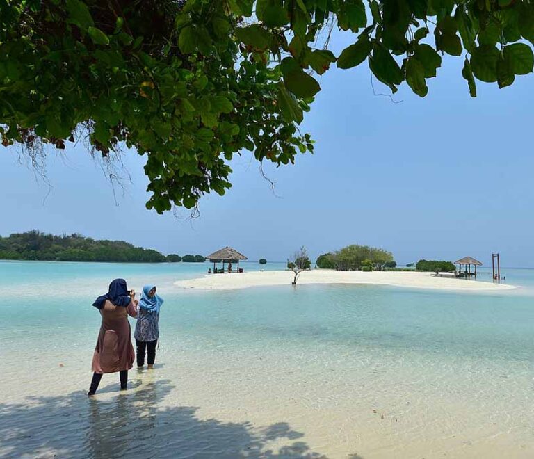 A girl enjoying Virgin beach at Pari island