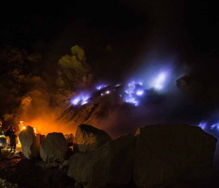 The miners during the blue fire of Ijen crater