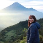 A-beautiful-girl-enjoying-the-landscape-of-Dieng-plateau