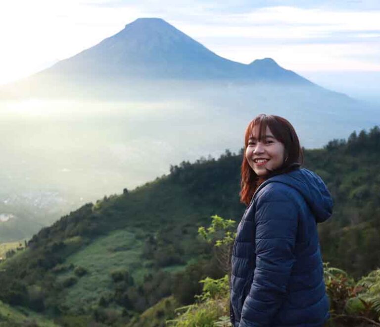 A-beautiful-girl-enjoying-the-landscape-of-Dieng-plateau