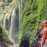A beutiful Girl at a Wonderfull Madakaripura Waterfall