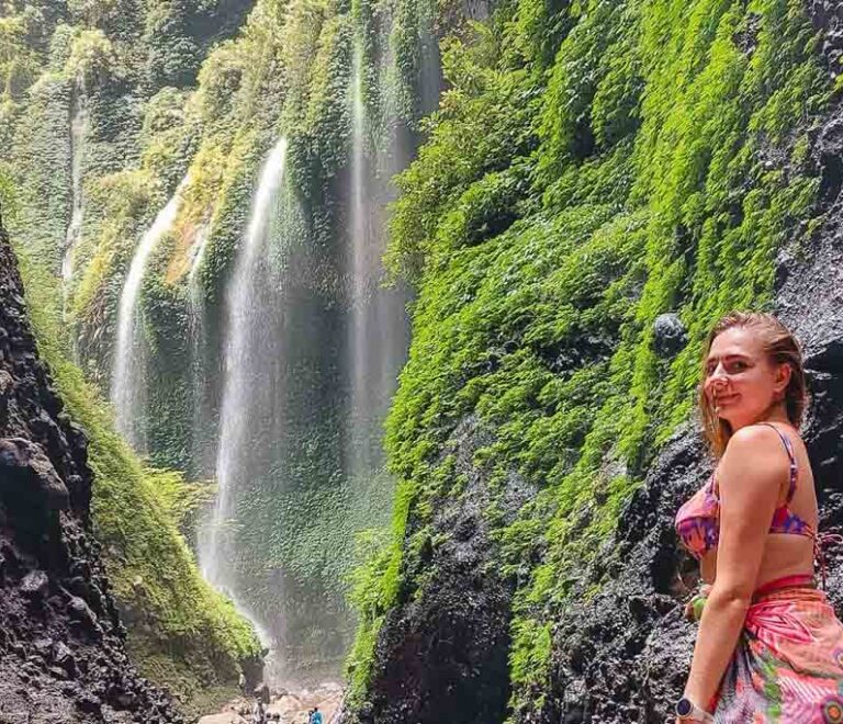 A beutiful Girl at a Wonderfull Madakaripura Waterfall