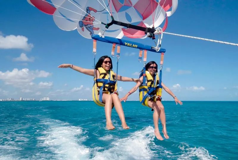 Girls Enjoying Parasailing in Tanjung Benoa Bali